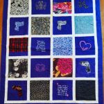 memory quilt with embroidered blocks